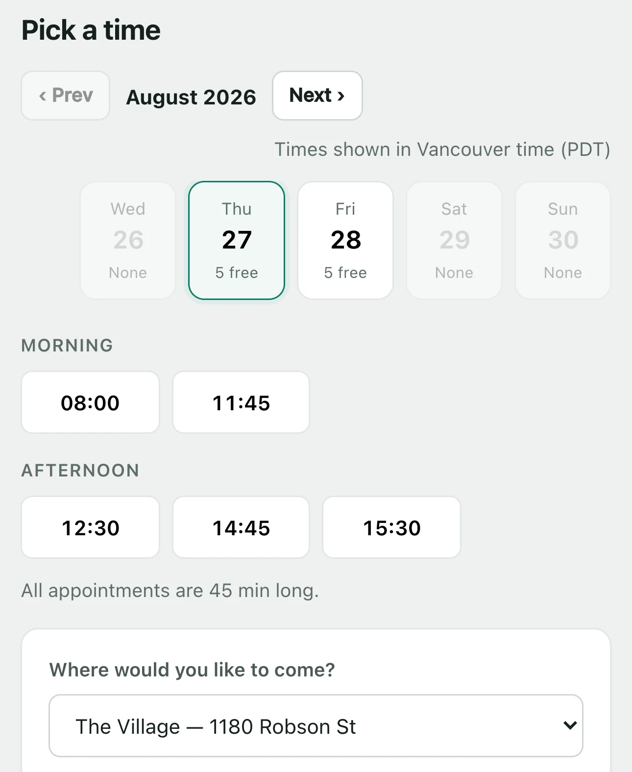 Choosing a time on the public booking page: free slots grouped into morning and afternoon, in the clinic’s own timezone.